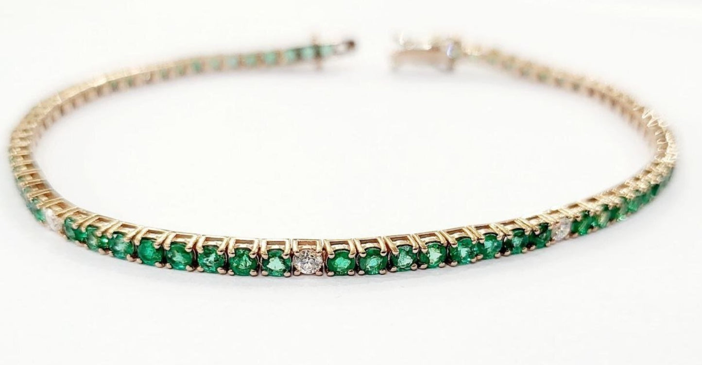 Bracciale tennis in oro e smeraldo naturale 10.08ct