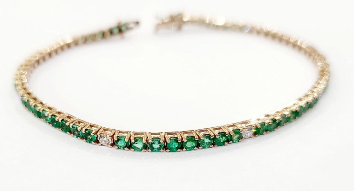 Bracciale tennis in oro e smeraldo naturale 10.08ct