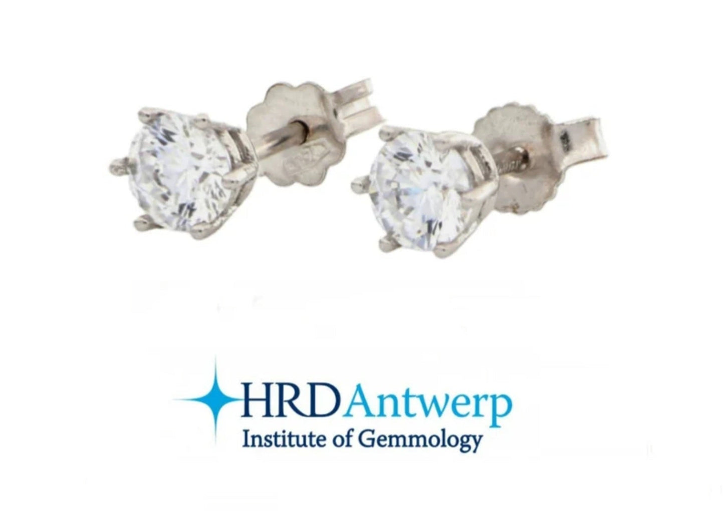 Pendientes de 6 garras con punto de luz en oro blanco de 18k y 2 diamantes naturales de 0,42 ct certificados por HRD