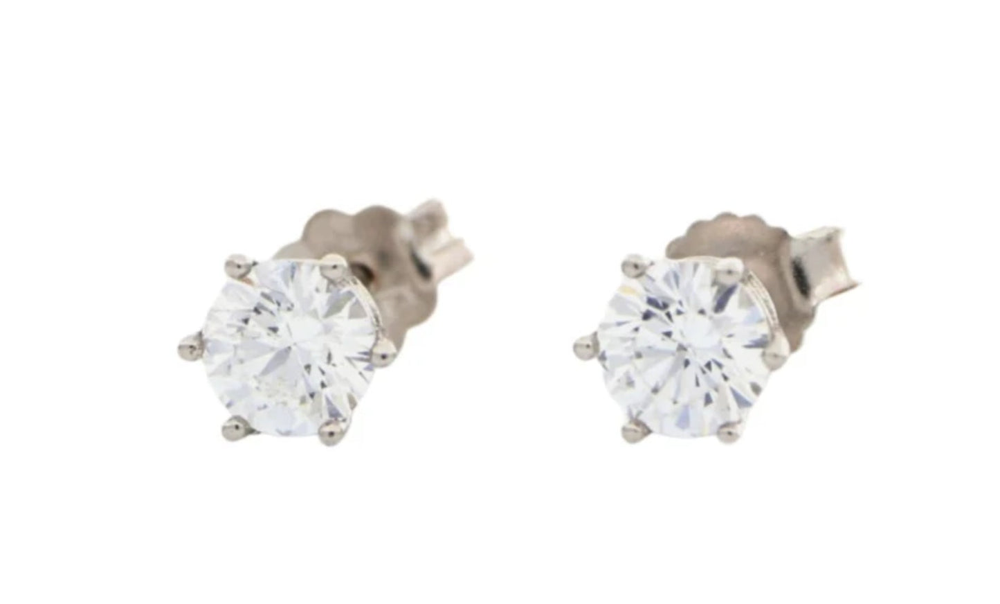 Pendientes de 6 garras con punto de luz en oro blanco de 18k y 2 diamantes naturales de 0,42 ct certificados por HRD