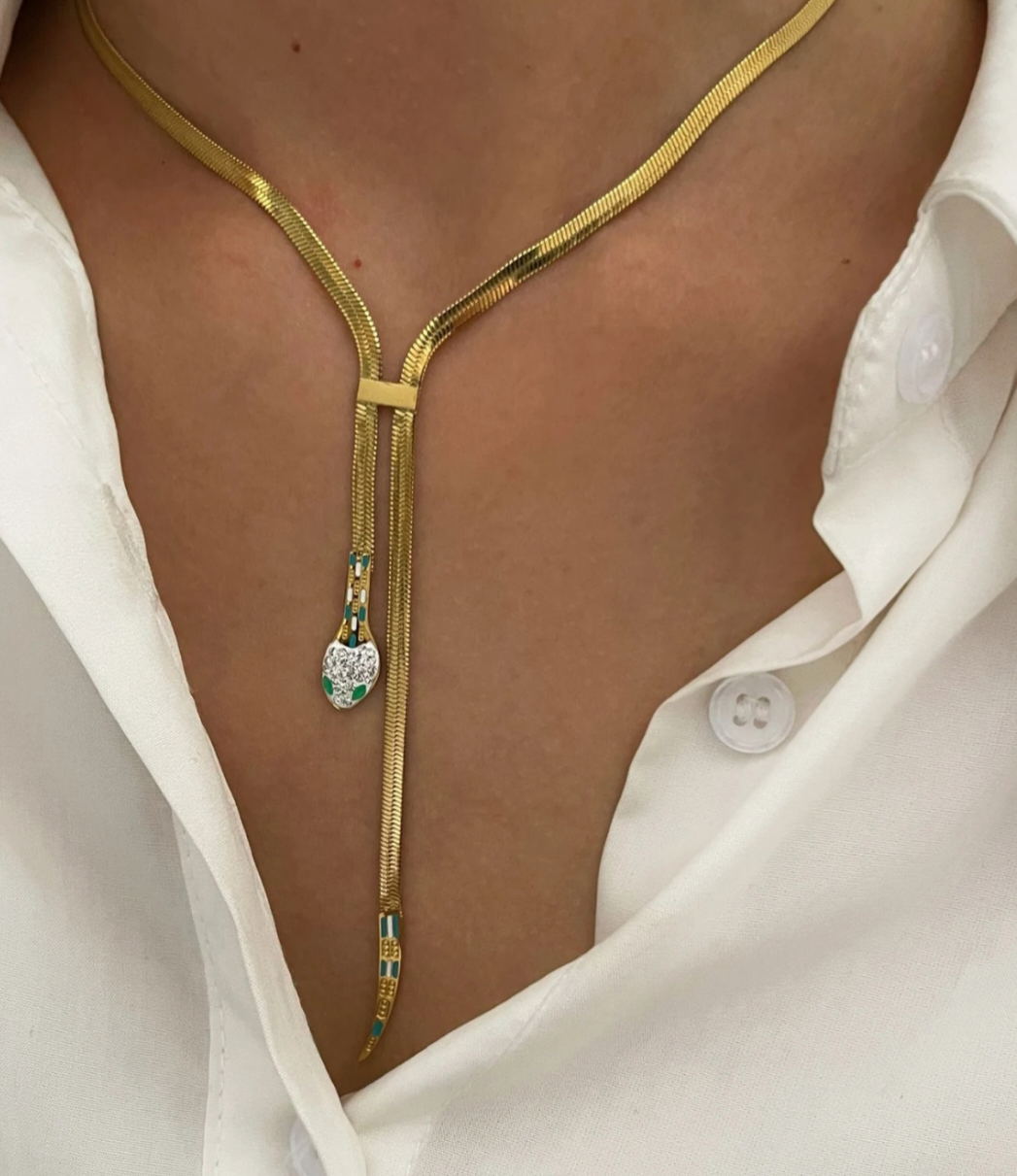 collana pendente serpente in  oro giallo con diamanti naturali e smeraldo