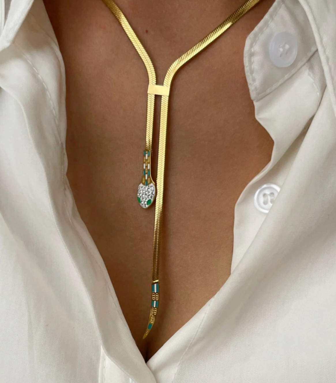 collana pendente serpente in  oro giallo con diamanti naturali e smeraldo